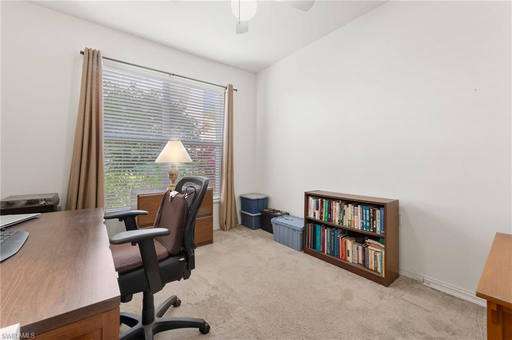 1953 Crestview Way, Unit 161 Naples, FL 34119 - Photo 14 of 37 a room with a workspace