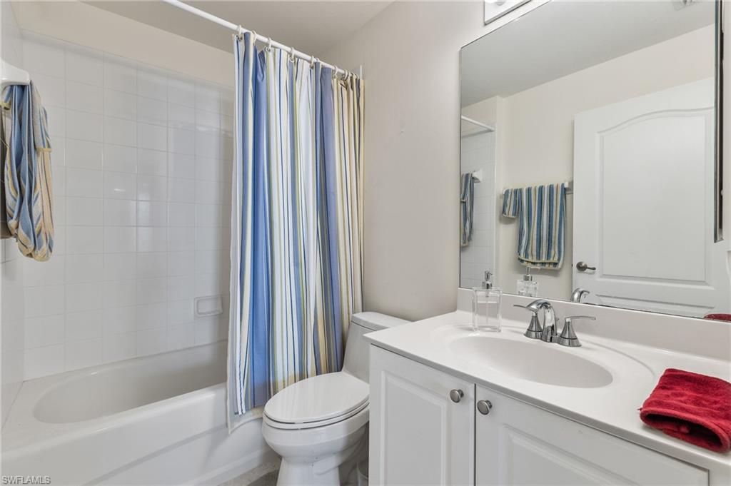 1953 Crestview Way, Unit 161 Naples, FL 34119 - Photo 20 of 37 a bathroom with a sink toilet and shower