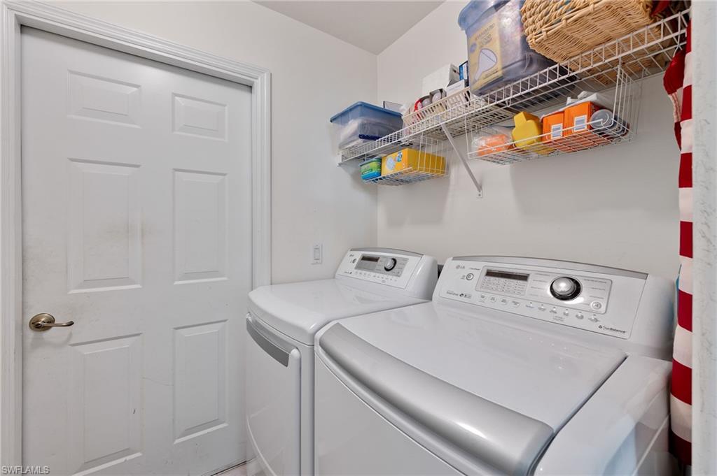 1953 Crestview Way, Unit 161 Naples, FL 34119 - Photo 23 of 37 a utility room with dryer and washer