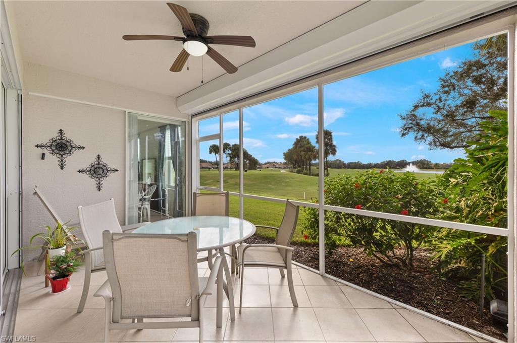 1953 Crestview Way, Unit 161 Naples, FL 34119 - Photo 24 of 37 a view of a dining room with furniture window and outside view