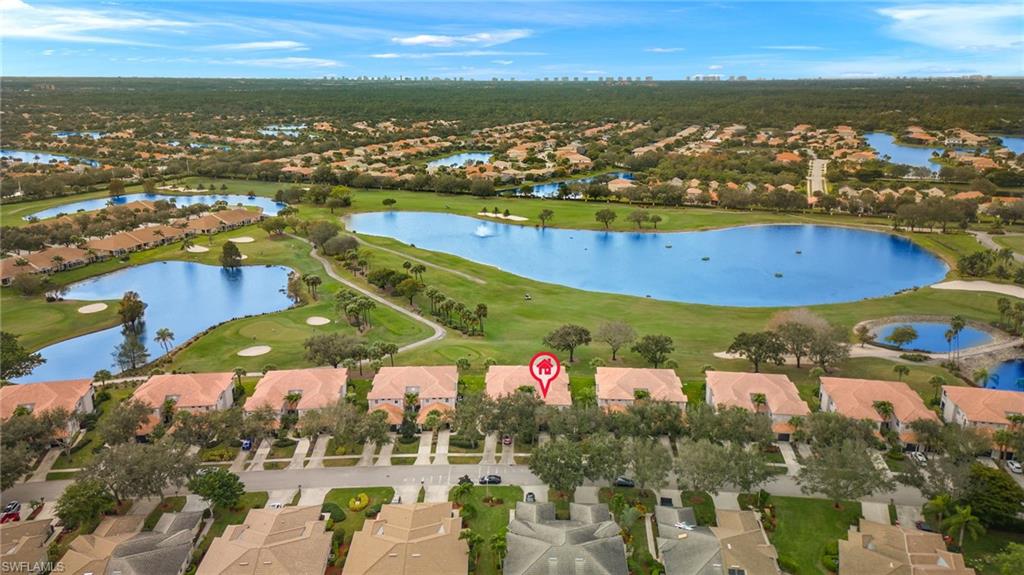 1953 Crestview Way, Unit 161 Naples, FL 34119 - Photo 36 of 37 an aerial view of residential houses with outdoor space
