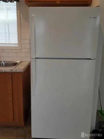 a bathroom with a sink and a shower