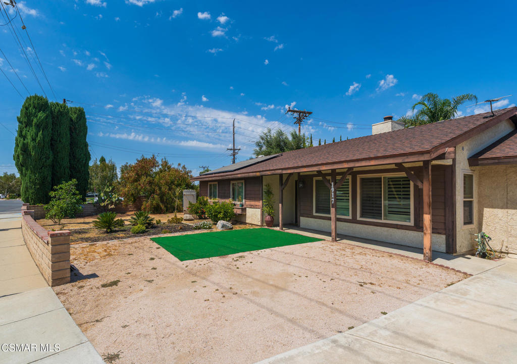 1917 Fitzgerald Road Simi Valley, CA 93065 - Photo 14 of 55 a front view of a house with a garden
