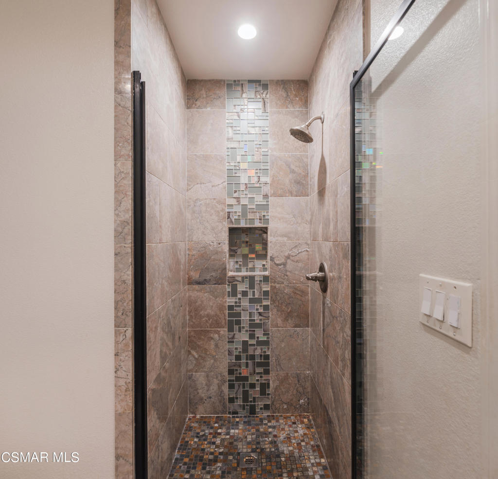 1917 Fitzgerald Road Simi Valley, CA 93065 - Photo 20 of 55 a bathroom with a shower
