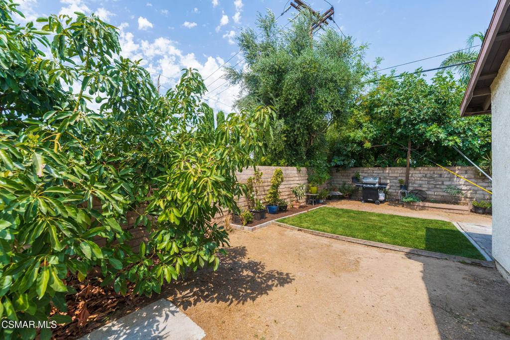 1917 Fitzgerald Road Simi Valley, CA 93065 - Photo 38 of 55 a view of backyard with seating area and green space