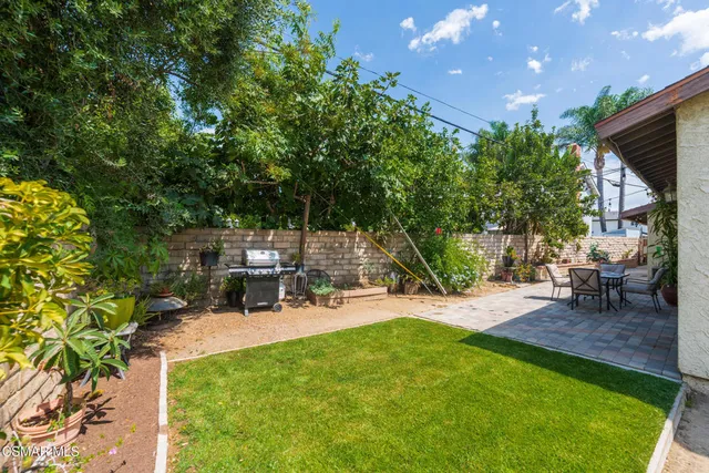 an aerial view of residential houses and street