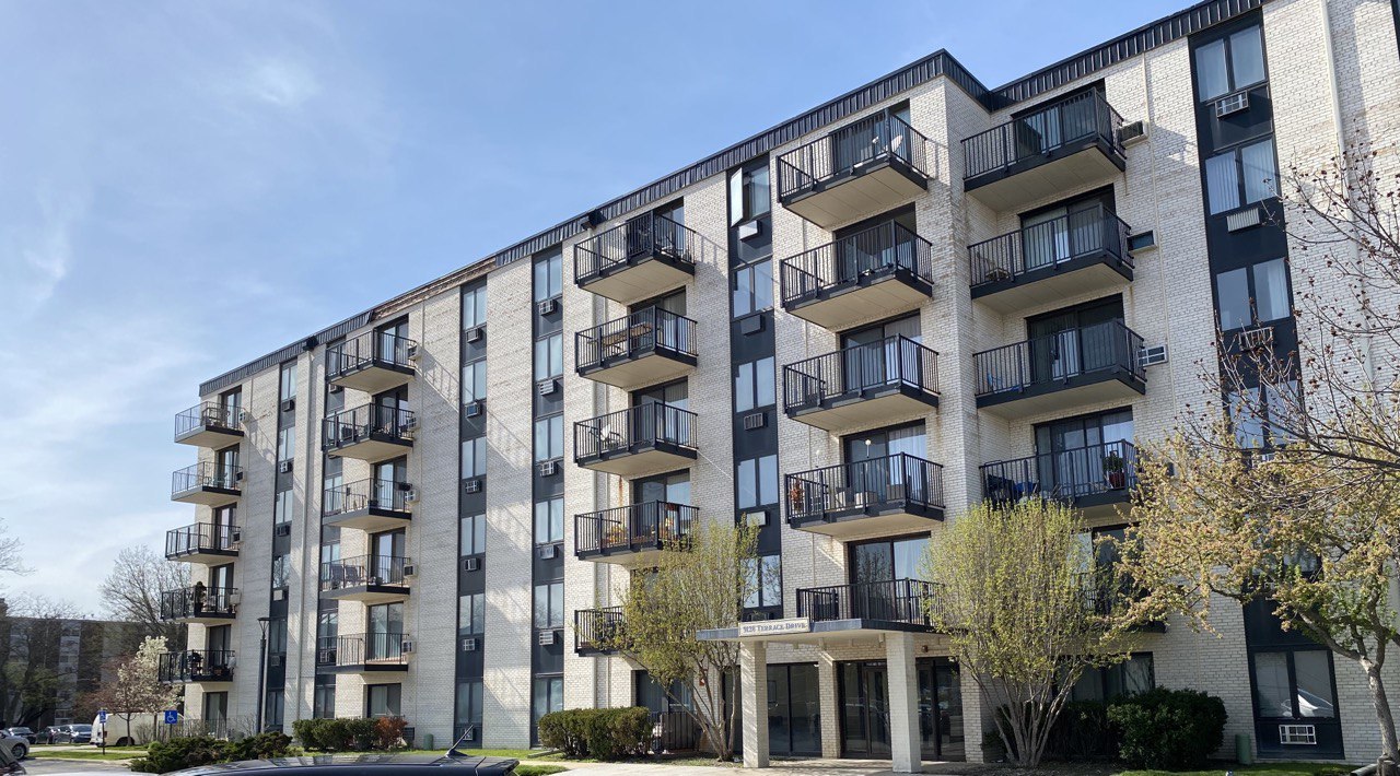 9128 West Terrace Drive, Unit 4B Niles, IL 60714 - Photo 1 of 24 a view of a building