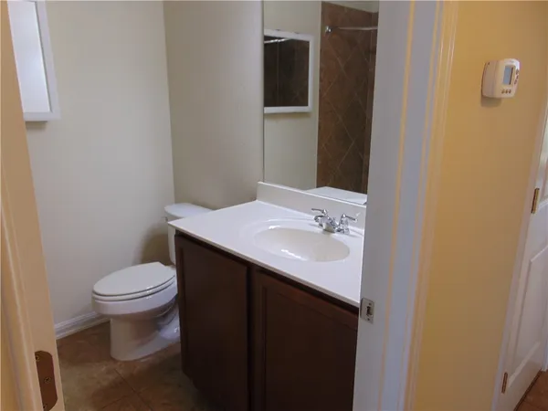 a bathroom with a sink and a toilet