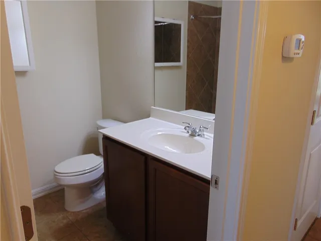 a bathroom with a sink and a toilet