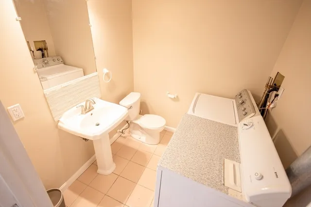a bathroom with a sink and mirror