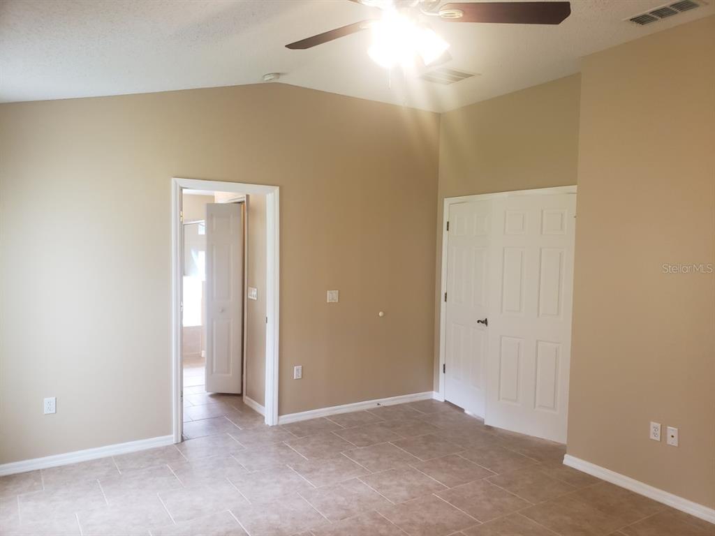 1 Westmar Place Palm Coast, FL 32164 - Photo 13 of 38 an empty room with a bathroom
