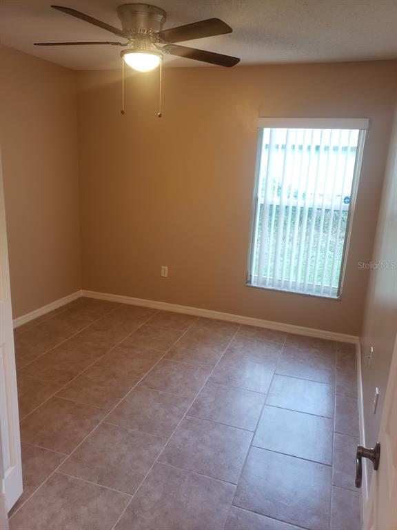 1 Westmar Place Palm Coast, FL 32164 - Photo 26 of 38 a view of an empty room with a window