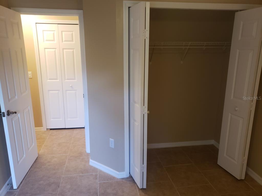 1 Westmar Place Palm Coast, FL 32164 - Photo 27 of 38 an empty room with windows