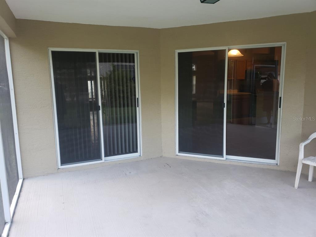 1 Westmar Place Palm Coast, FL 32164 - Photo 34 of 38 a view of an empty room with closet and wooden floor