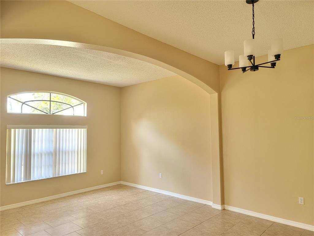 1 Westmar Place Palm Coast, FL 32164 - Photo 4 of 38 a view of an empty room and window