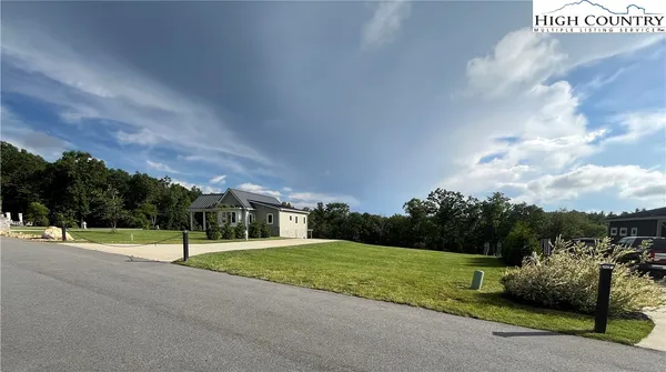 a view of a park with welcome board