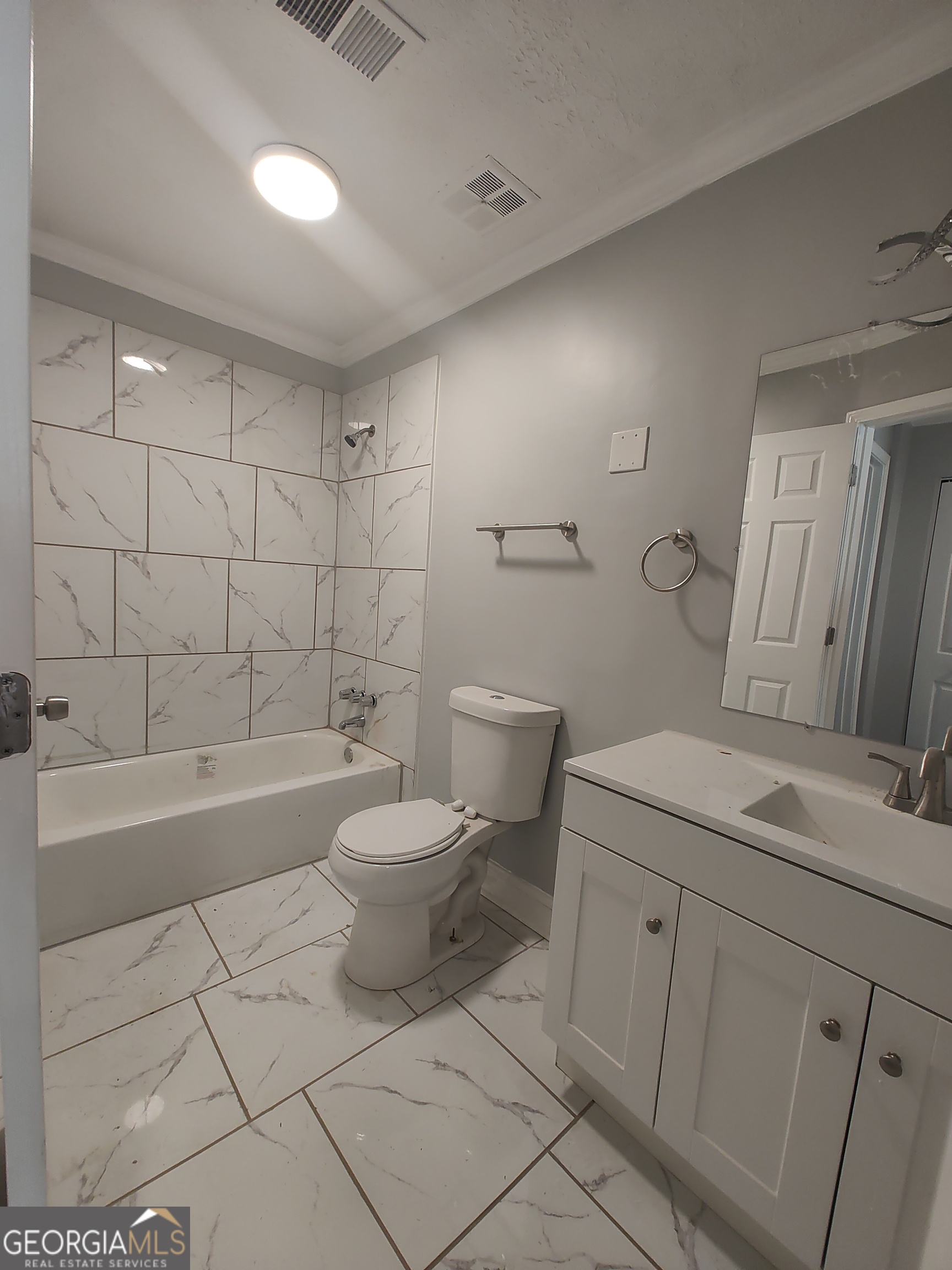 1625 Conley Road, Unit 275 Conley, GA 30288 - Photo 12 of 15 a bathroom with a toilet sink and bathtub
