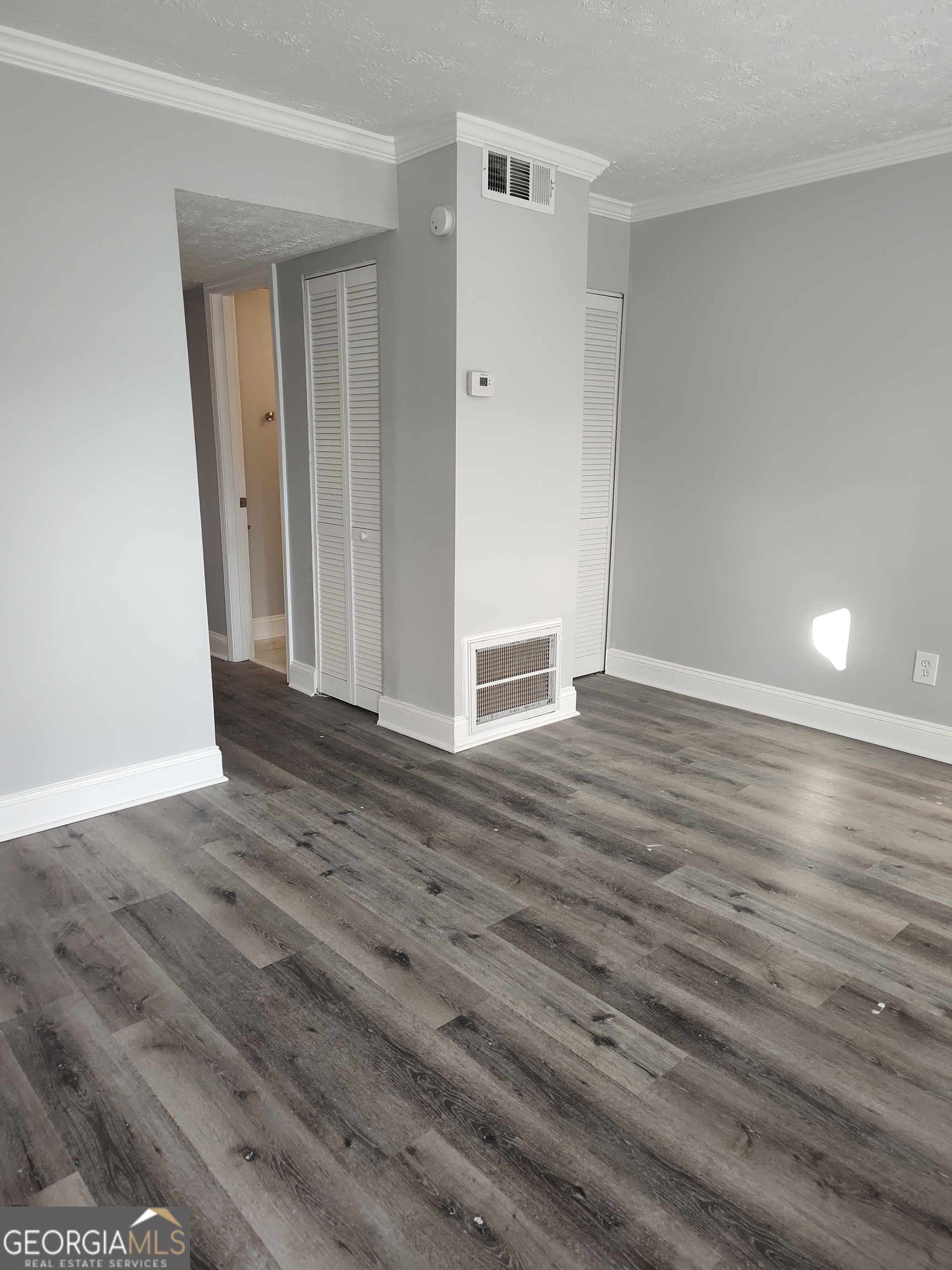 1625 Conley Road, Unit 275 Conley, GA 30288 - Photo 3 of 15 wooden floor in an empty room