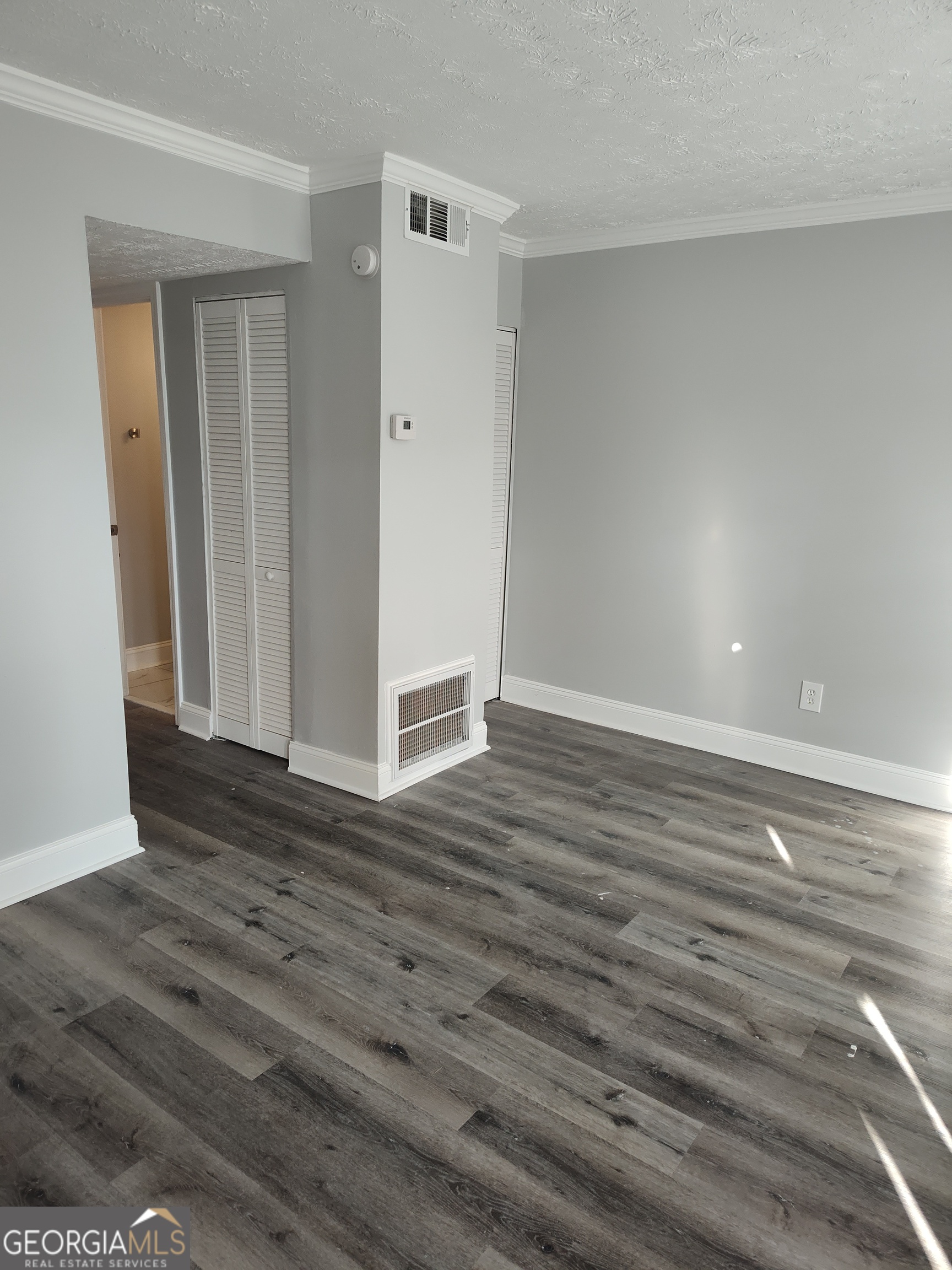 1625 Conley Road, Unit 275 Conley, GA 30288 - Photo 4 of 15 a view of wooden floor and windows in a room