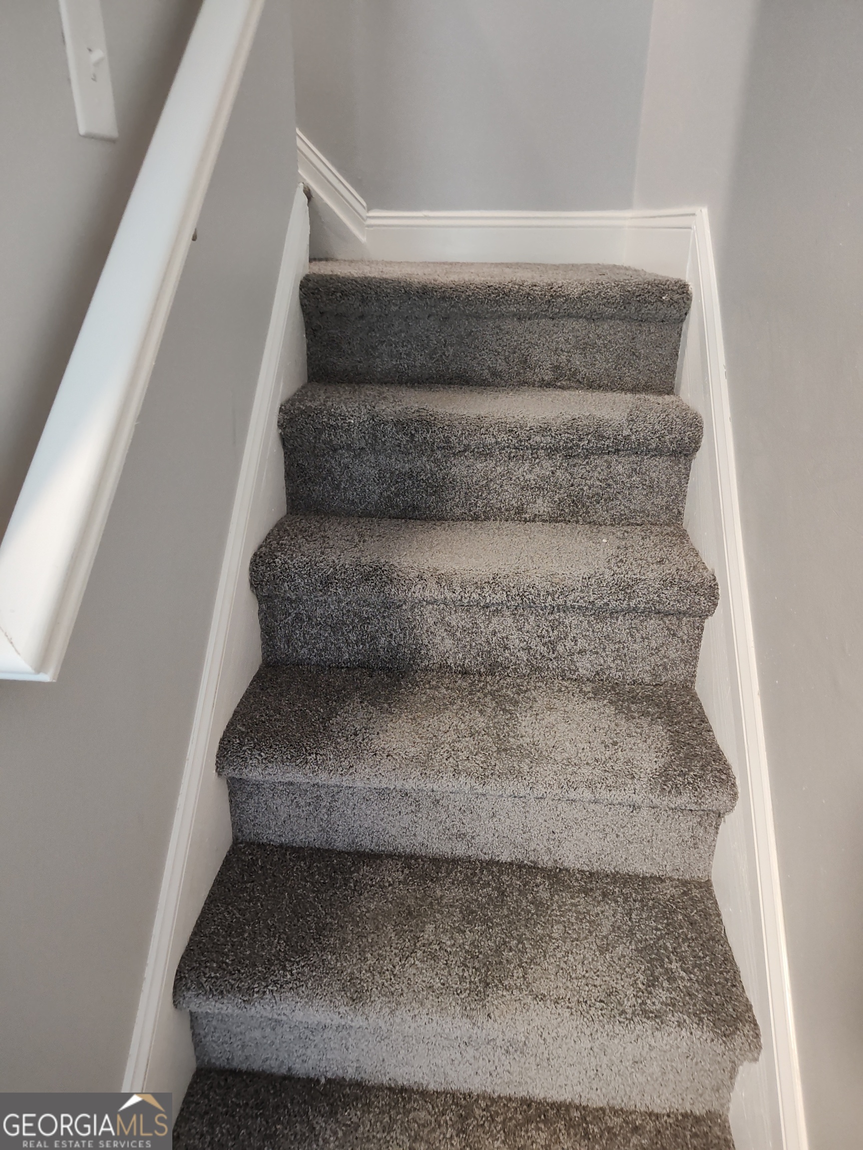 1625 Conley Road, Unit 275 Conley, GA 30288 - Photo 9 of 15 a view of staircase with white walls