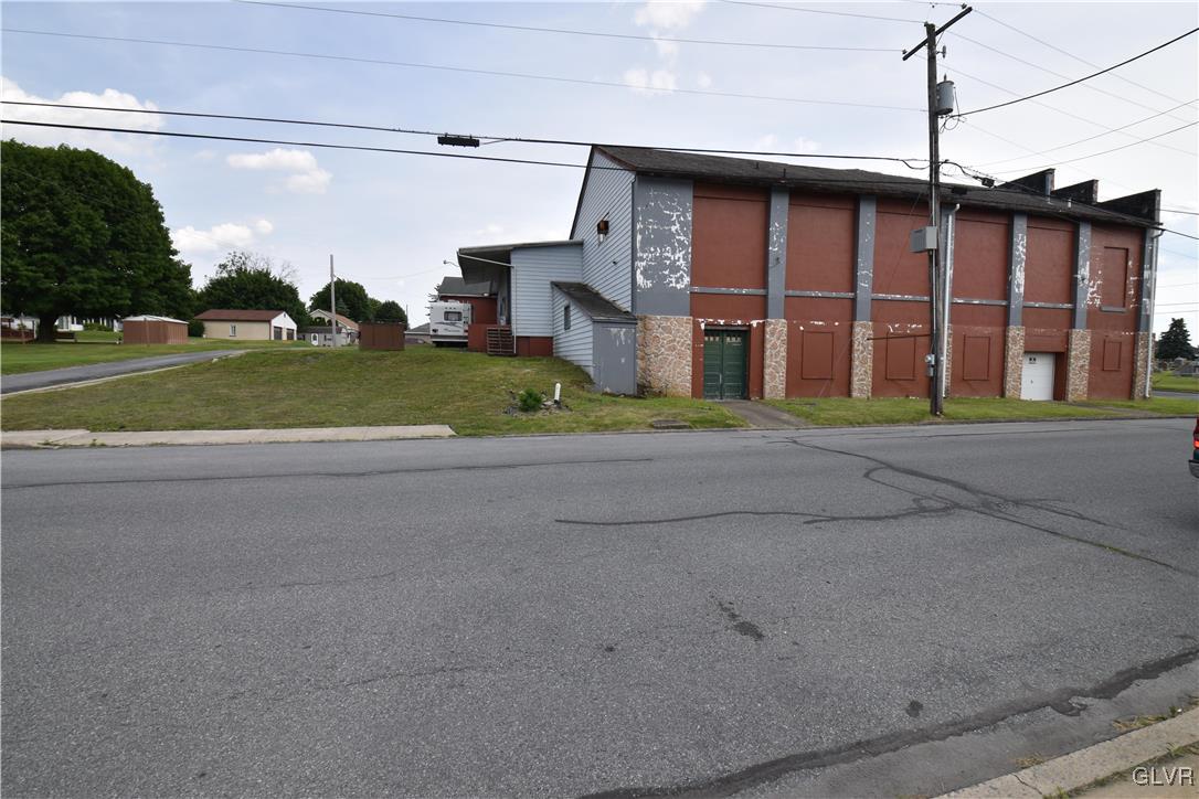 155 North 9th Street Coplay, PA 18037 - Photo 6 of 29 a front view of residential houses with yard and road