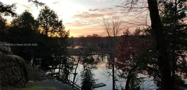 a view of mountain view with lots of trees