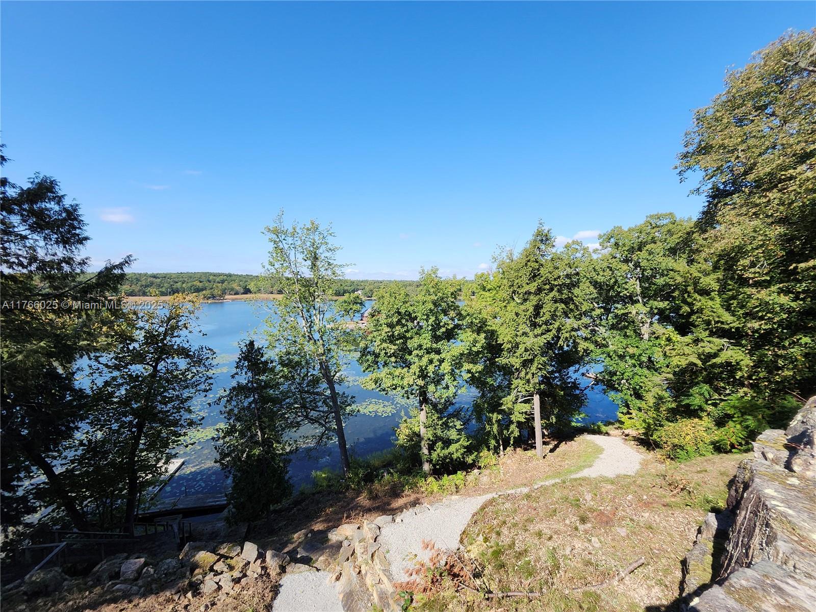 18435 Otter Point Road Wellesley Island, NY 13640 - Photo 26 of 27 a view of a backyard of the house