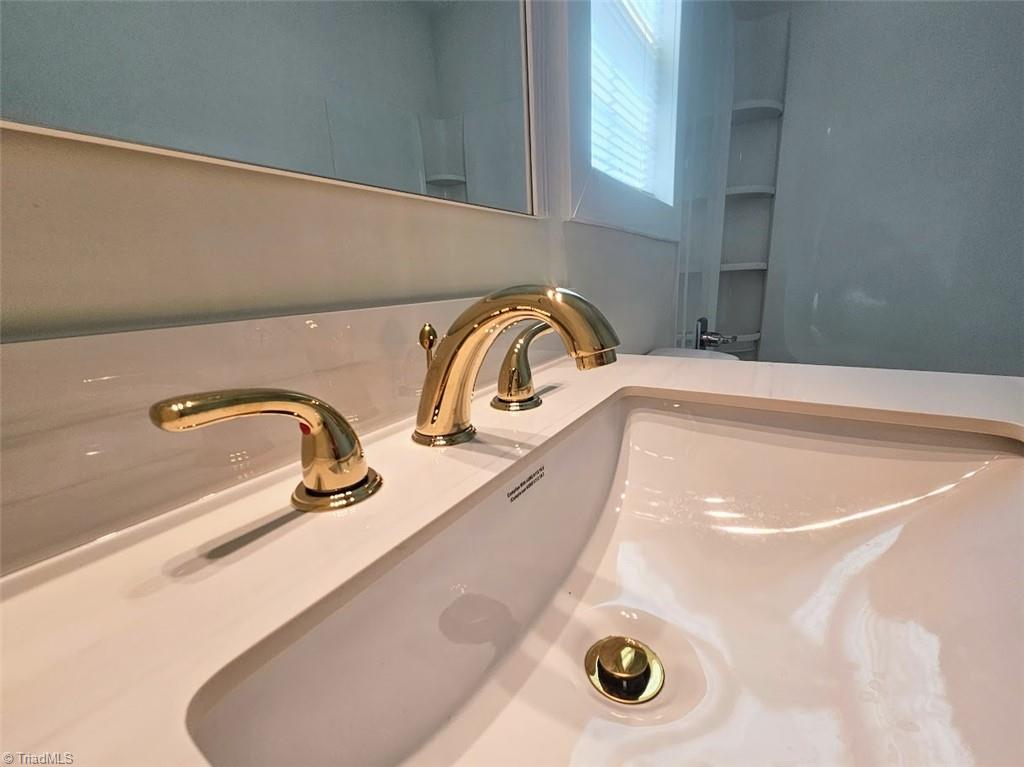 1915 Blain Street High Point, NC 27262 - Photo 13 of 24 Primary bathroom