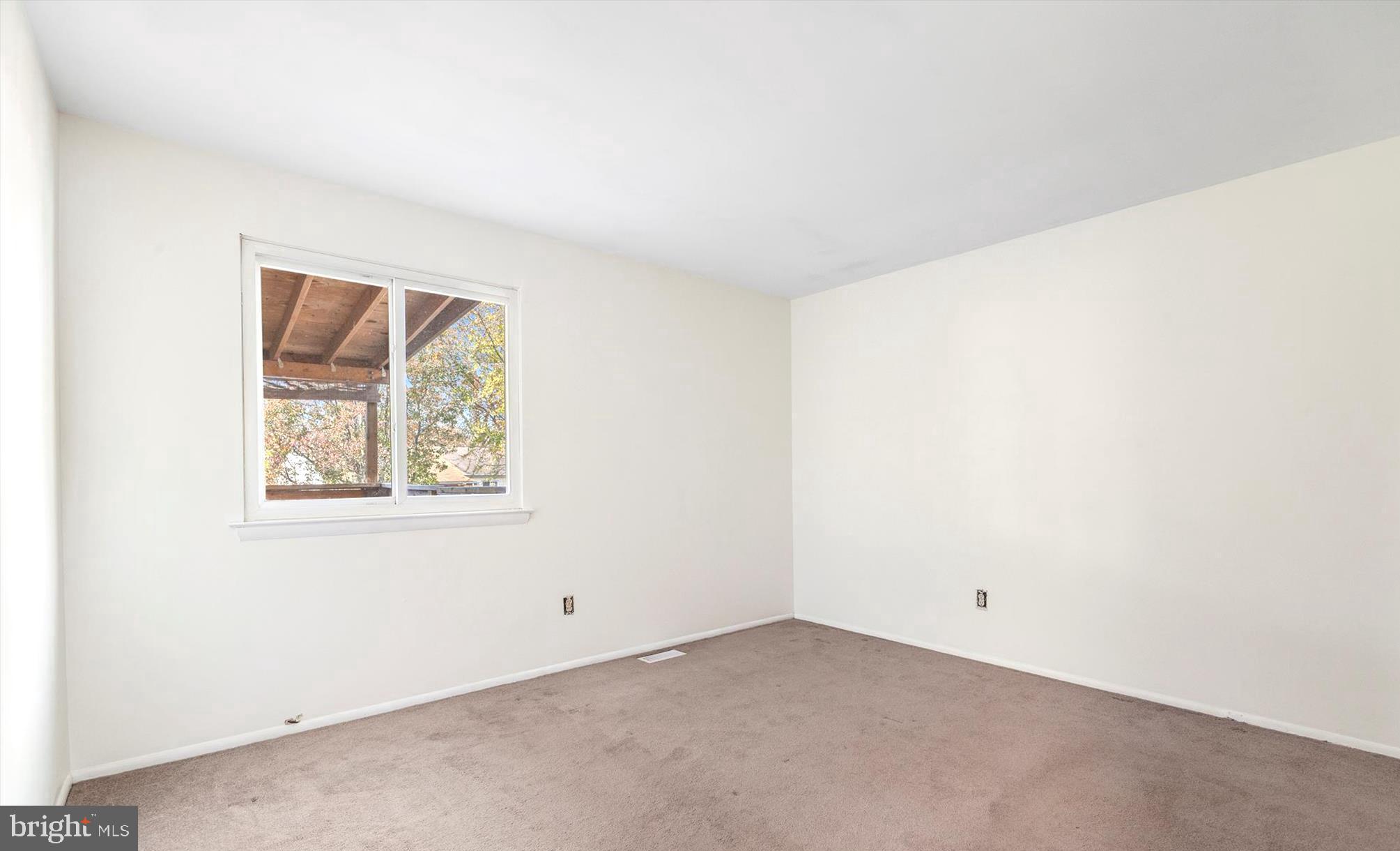 7740 Notley Road Pasadena, MD 21122 - Photo 16 of 46 an empty room with a window