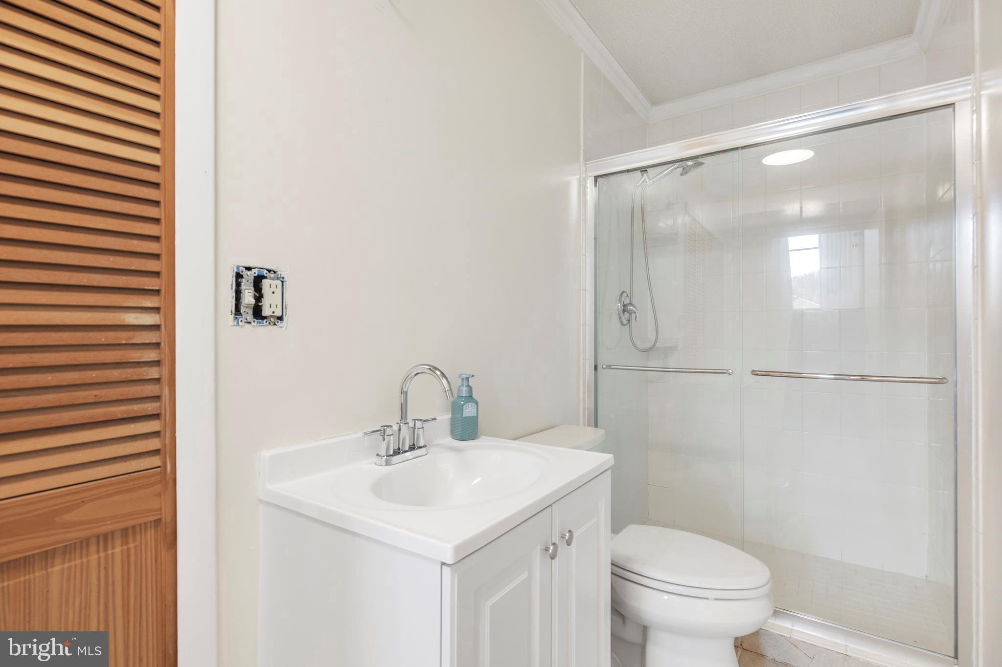 7740 Notley Road Pasadena, MD 21122 - Photo 20 of 46 a bathroom with a sink toilet and shower