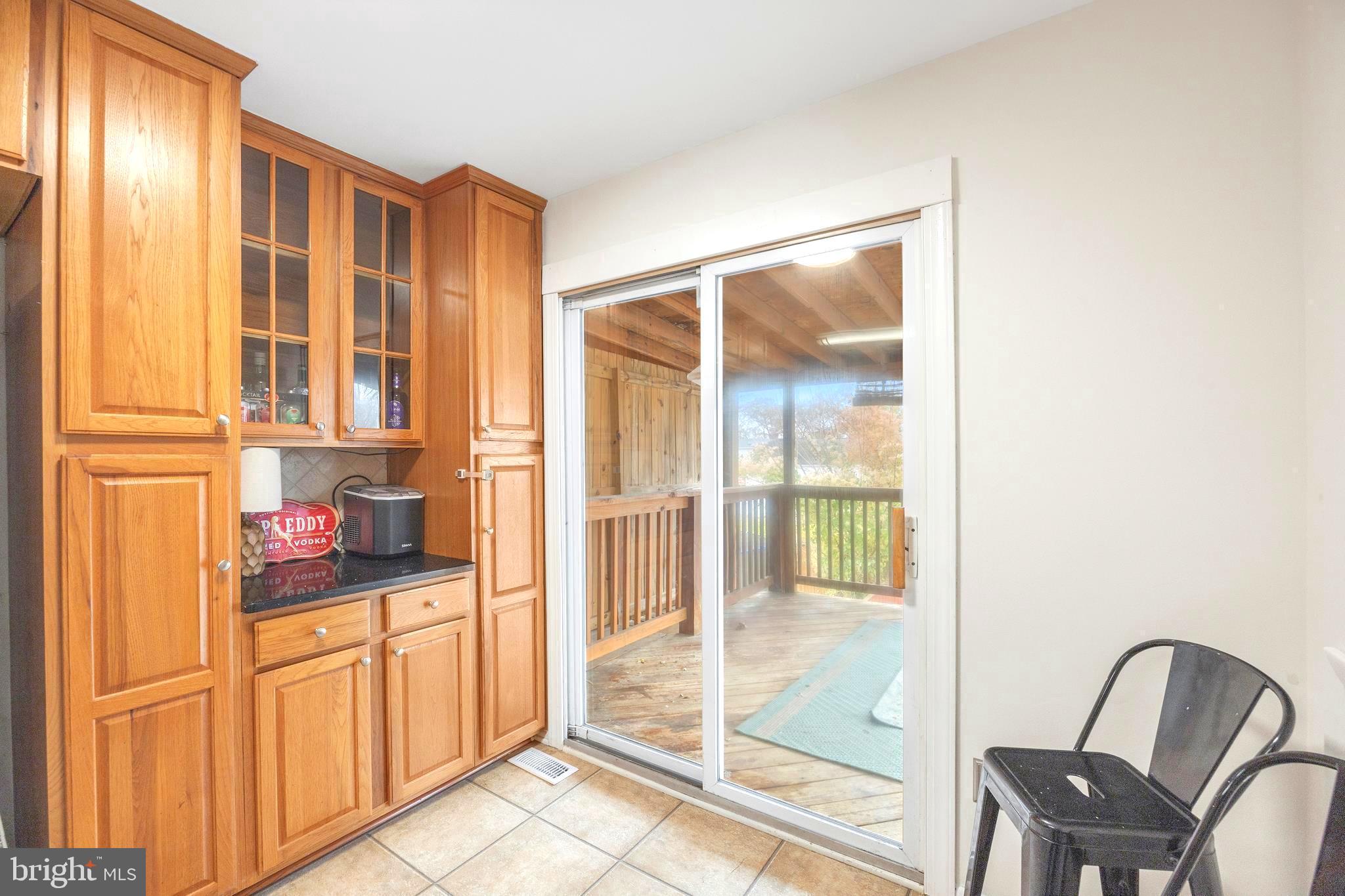 7740 Notley Road Pasadena, MD 21122 - Photo 3 of 46 a view of a balcony and chair