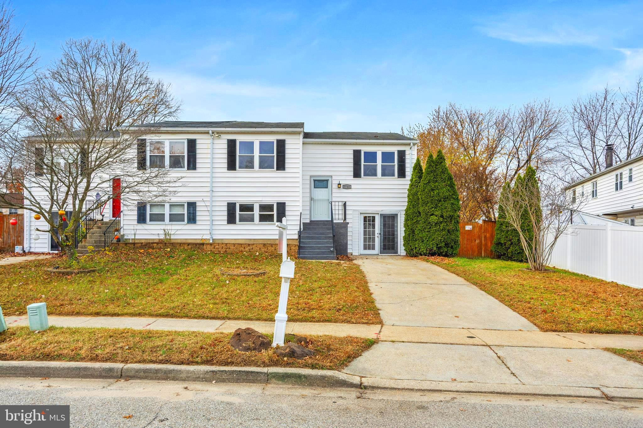7740 Notley Road Pasadena, MD 21122 - Photo 39 of 46 a view of a house with a swimming pool