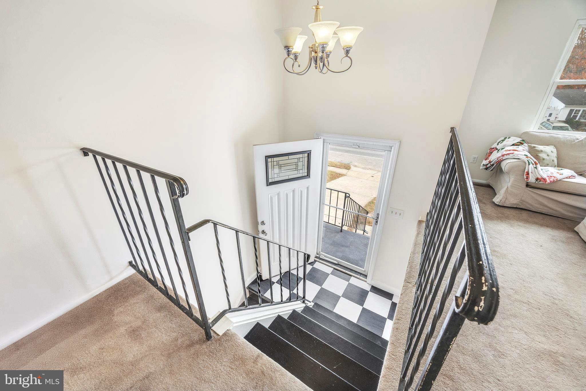 7740 Notley Road Pasadena, MD 21122 - Photo 40 of 46 a view of a balcony with staircase