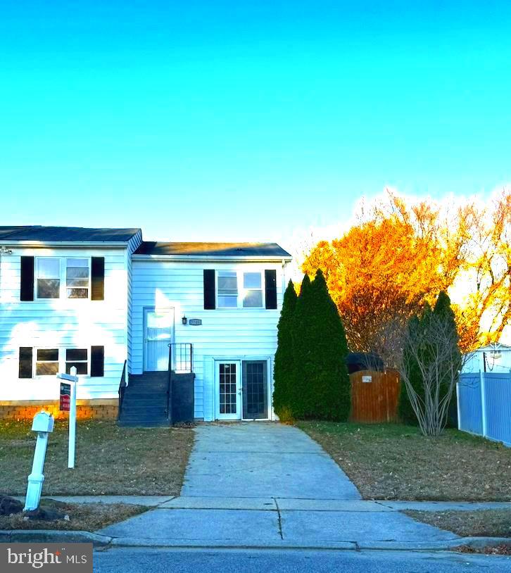 7740 Notley Road Pasadena, MD 21122 - Photo 44 of 46 a front view of a house with garden