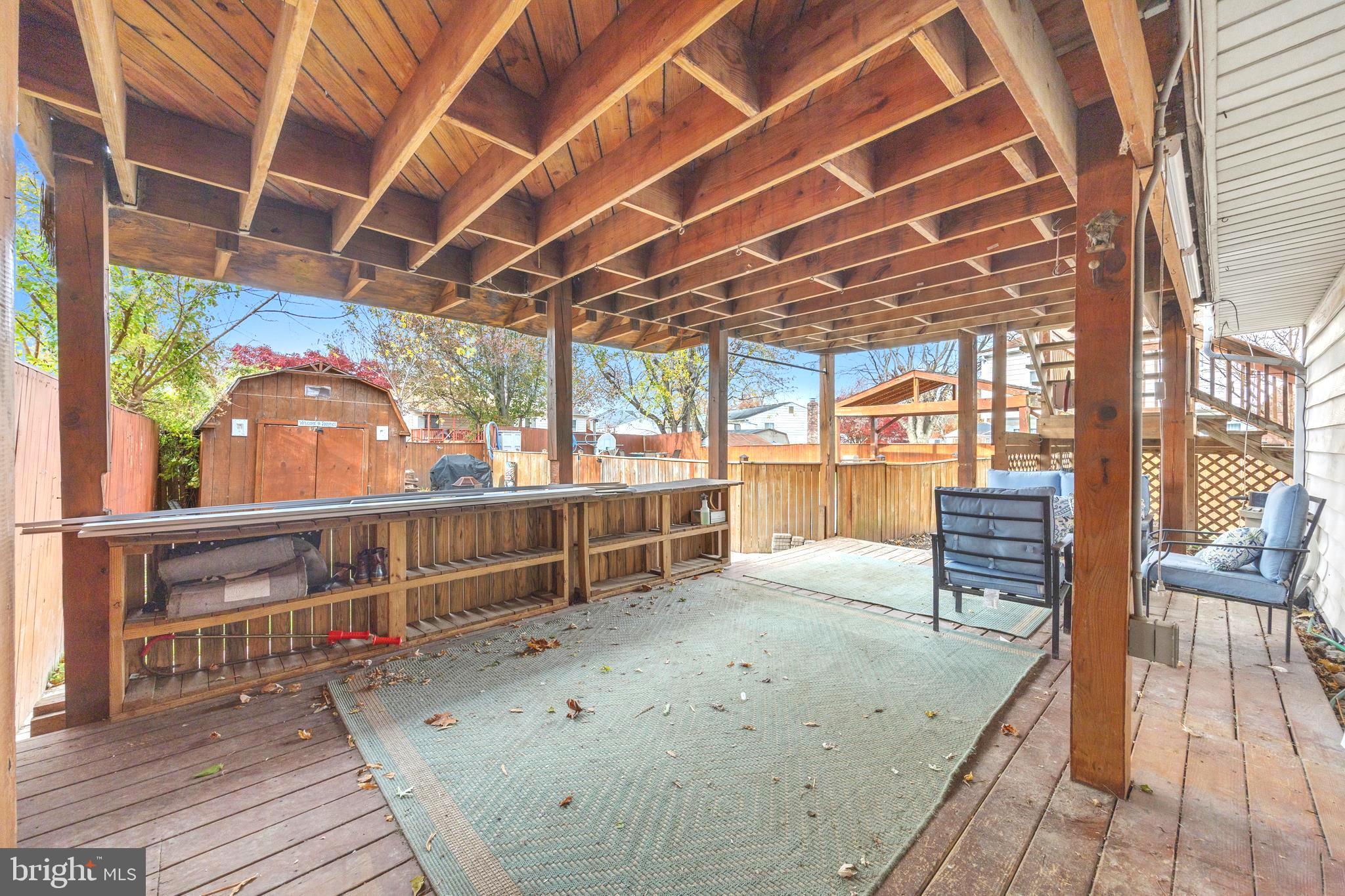 7740 Notley Road Pasadena, MD 21122 - Photo 8 of 46 a view of a swimming pool with a patio