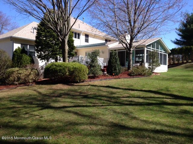 292 Nottingham Road Morganville, NJ 07751 - Photo 3 of 22 a front view of a house with a yard