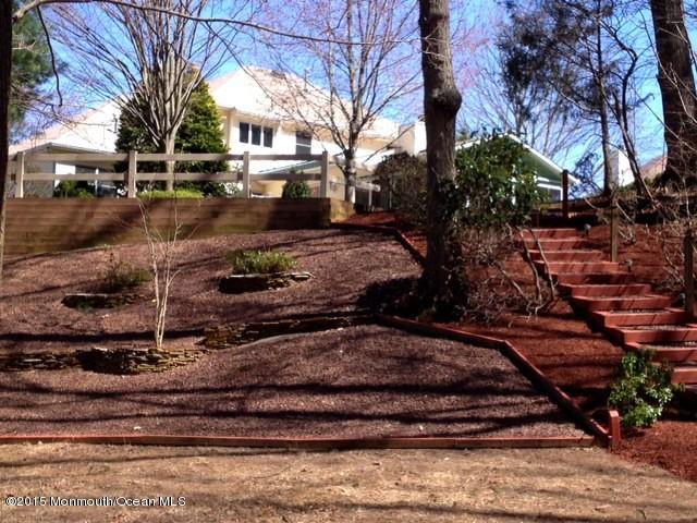 292 Nottingham Road Morganville, NJ 07751 - Photo 4 of 22 a view of a yard with an outdoor space
