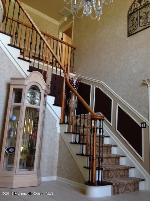 292 Nottingham Road Morganville, NJ 07751 - Photo 5 of 22 a view of entryway and hall with wooden floor