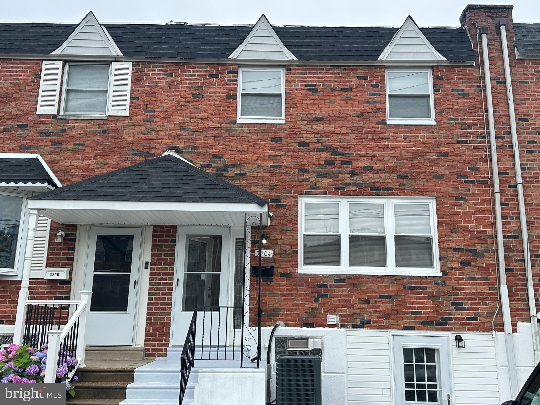 3204 Belgreen Road Philadelphia, PA 19154 - Photo 1 of 27 a front view of a house with a yard