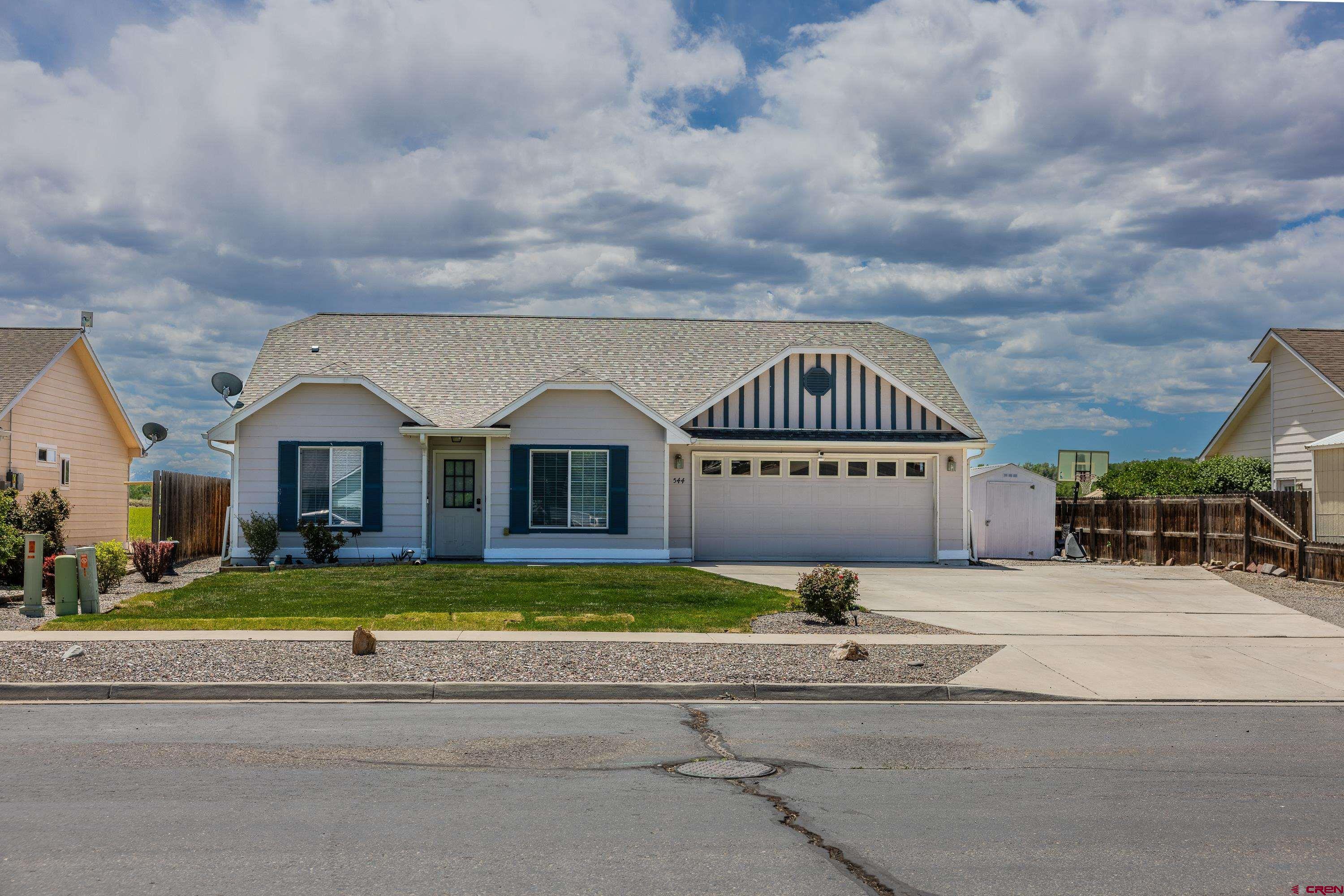 544 20th Street Delta, CO 81416 - Photo 36 of 44 a view of multiple houses with a yard