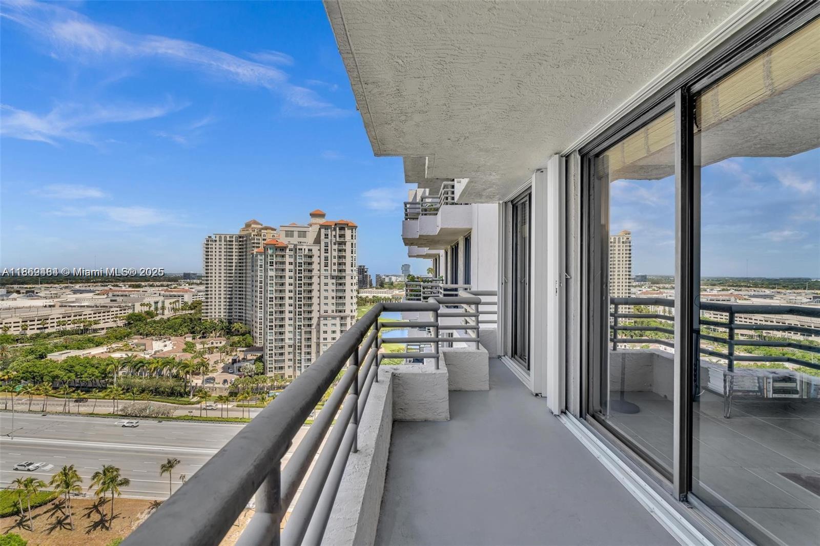 3300 Northeast 191st Street, Unit LP04 Aventura, FL 33180 - Photo 12 of 16 a view of balcony with two chairs