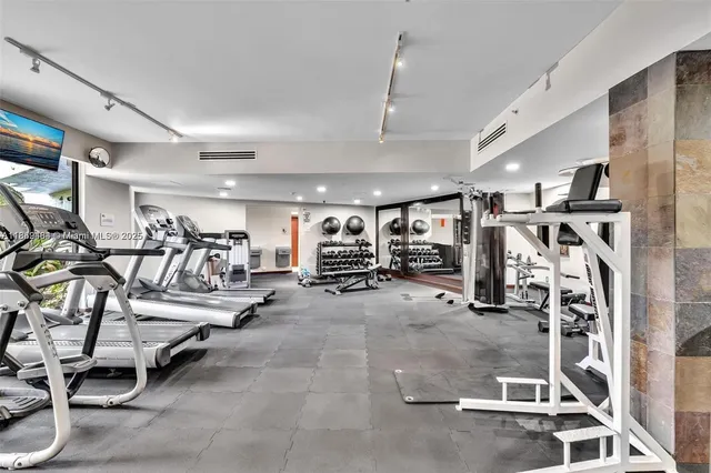 a view of a room with gym equipment