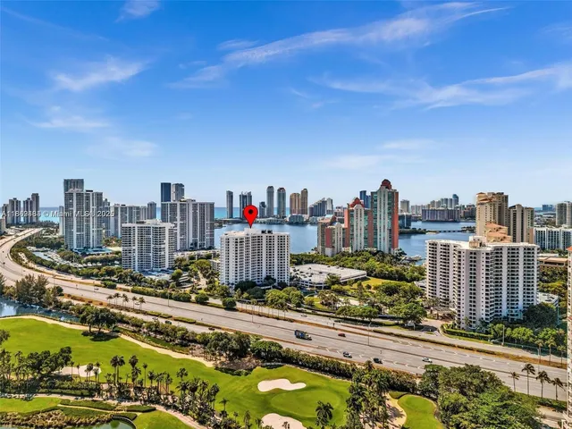 a view of a city with tall buildings
