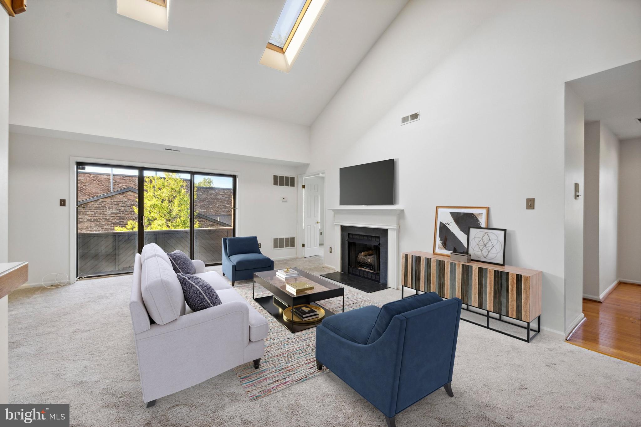 1009 Mountainview Drive Chesterbrook, PA 19087 - Photo 5 of 17 Sun -filled living room with sky lights.