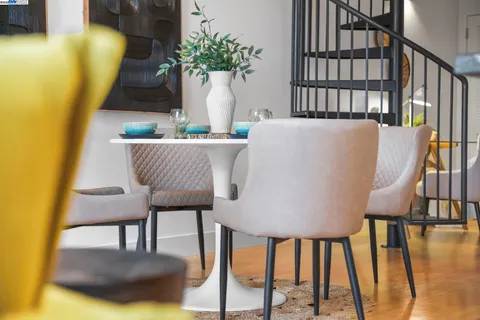 a room with a table and chairs