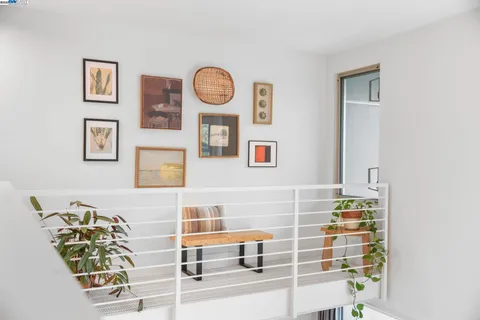 a view of living room with furniture and a window