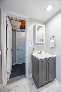 a view of hallway with washer and dryer
