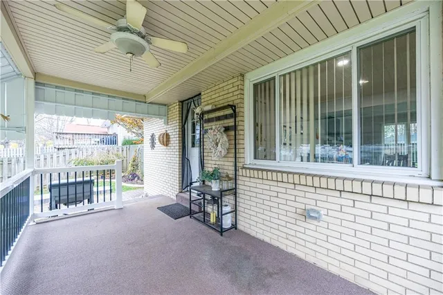a view of an empty room with a balcony