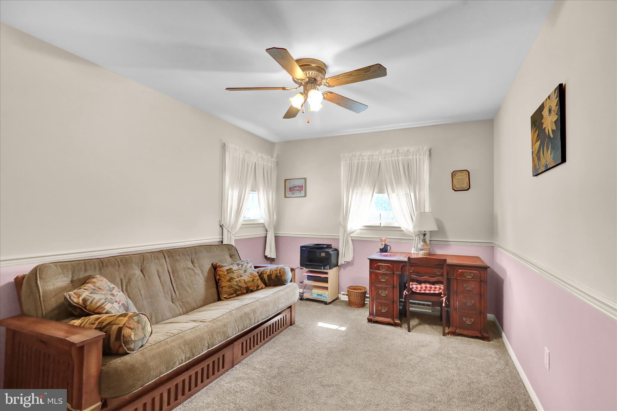 3029 Merritt Parkway Reading, PA 19608 - Photo 15 of 36 a living room with furniture a ceiling fan and a window