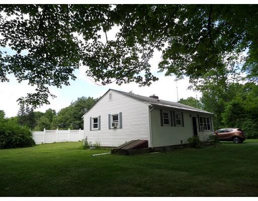 15 Sam Hill Road Worthington, MA 01098 - Photo 2 of 18 a front view of a house with a garden